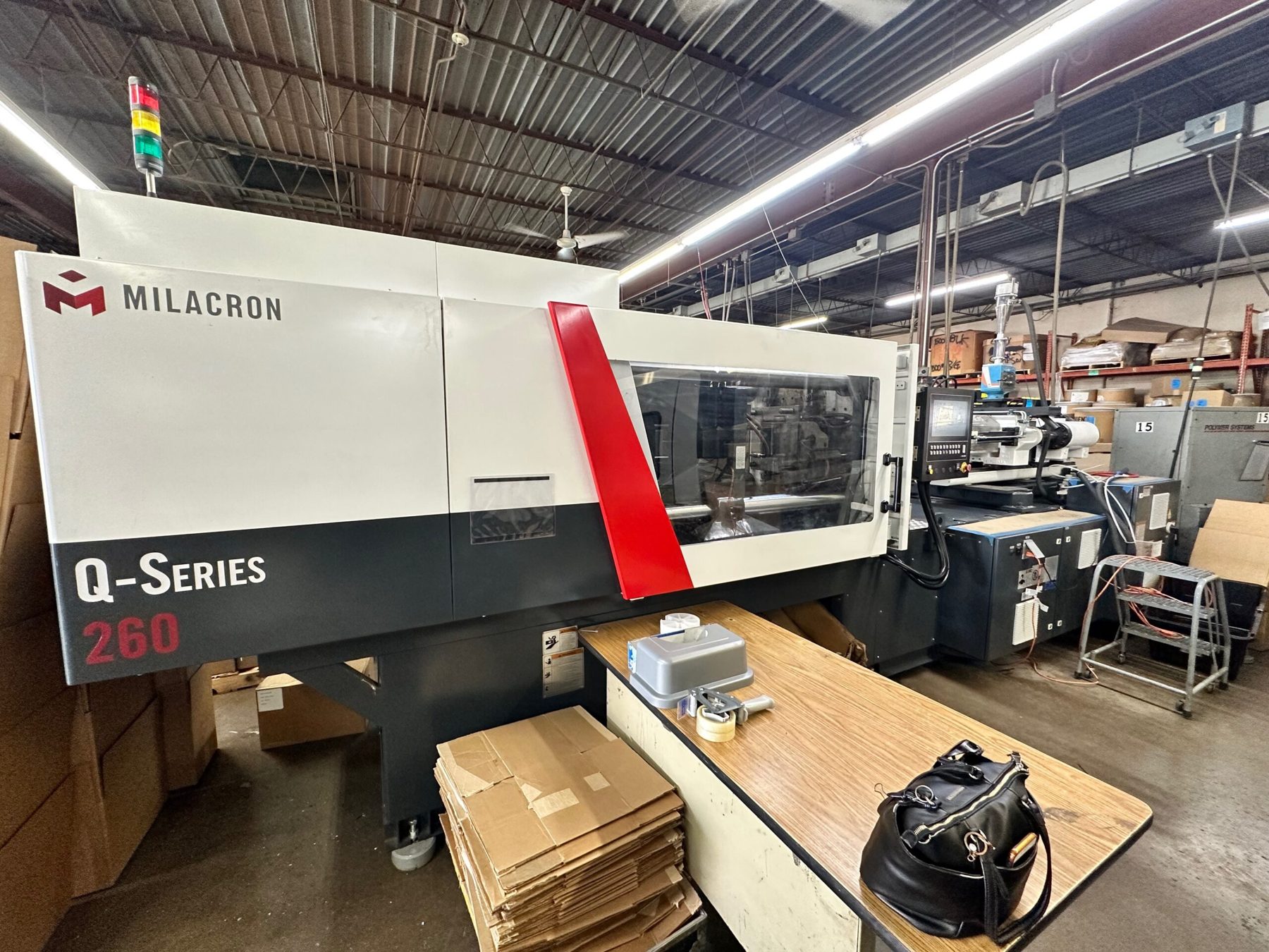 Milacron Q-Series 260 injection molding machine at Superior Plastics
